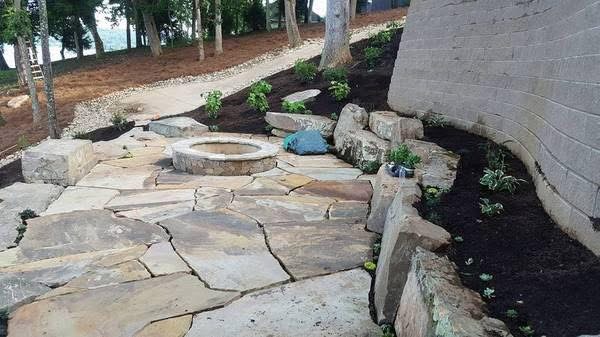 Outdoor patio and firepit area built by King Kelly Concrete Company